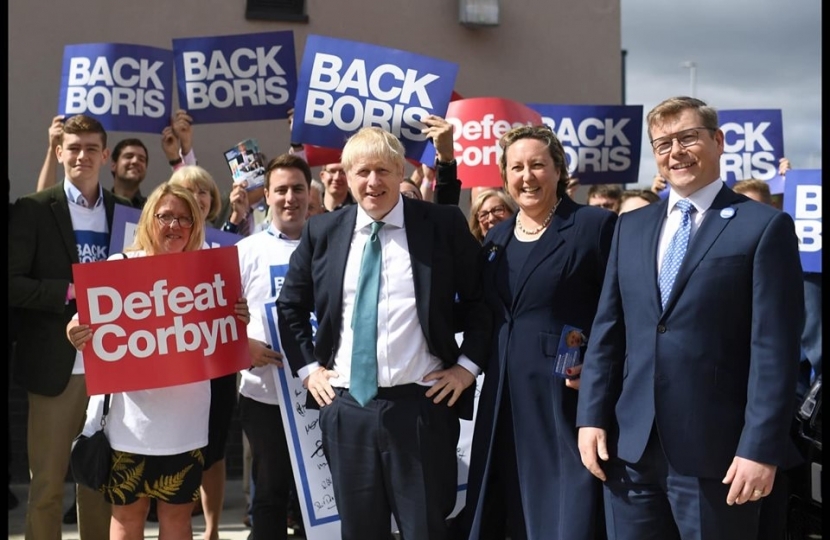 Peter stands with Boris in Darlington